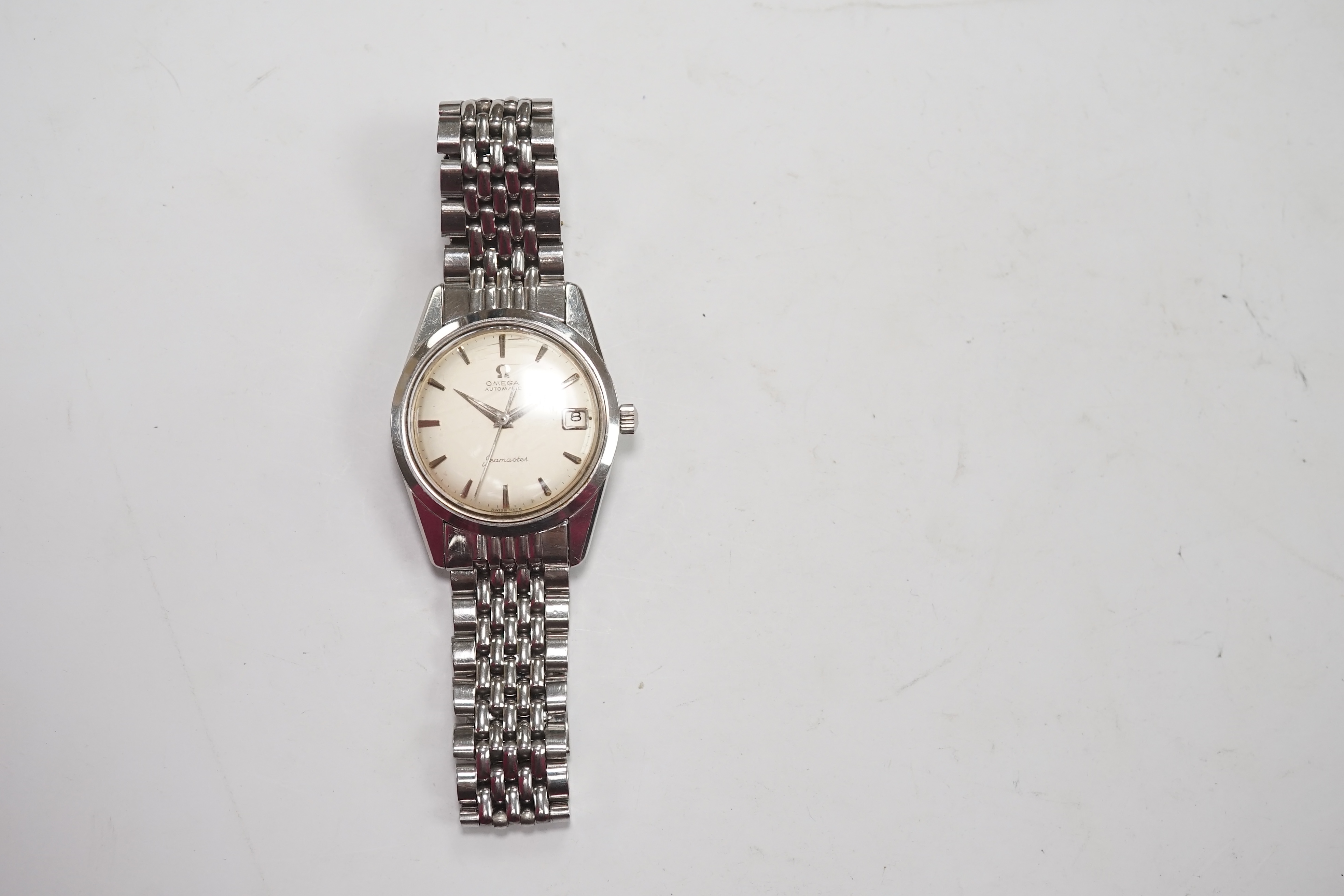 A gentleman's 1960's? stainless steel Omega Seamaster Automatic wrist watch, with baton numerals and date aperture, case diameter 35mm, no box or papers. Condition - poor to fair